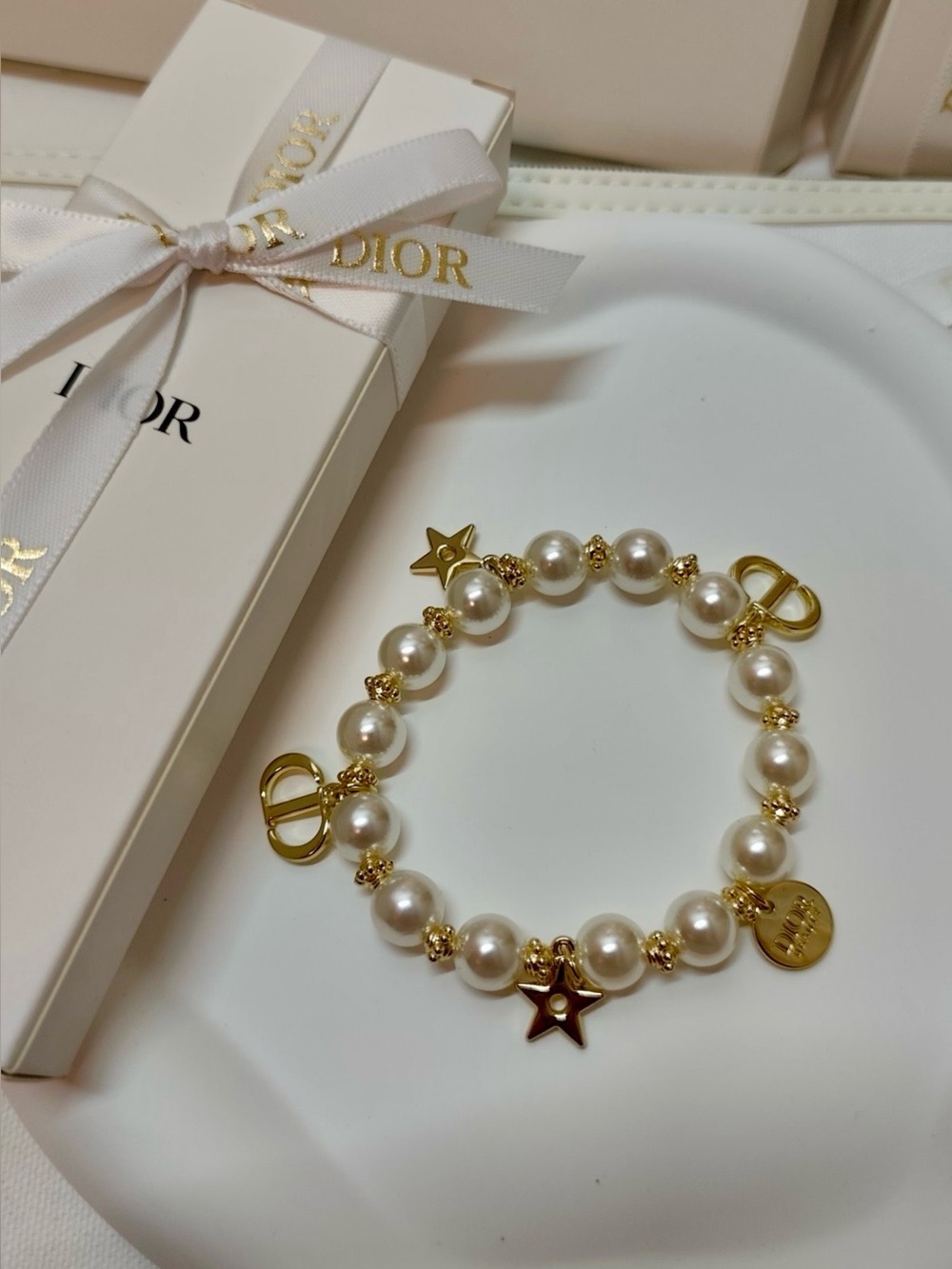 Dior GWP bracelet with cream pearls and gold charms